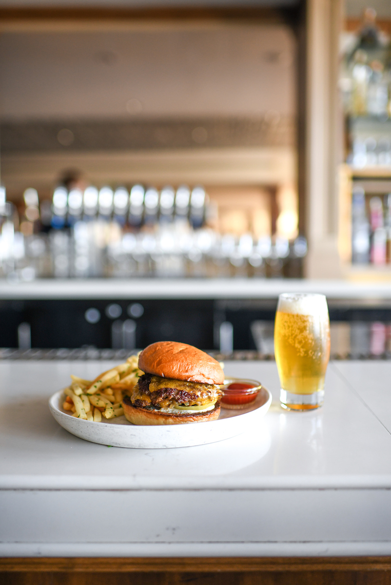 burger and beer at the bar